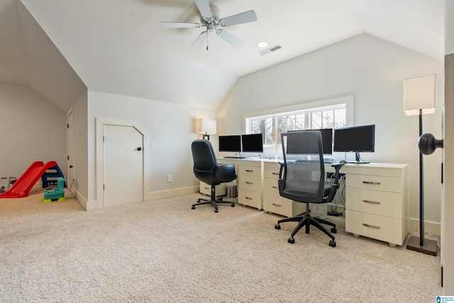 carpeted home office with ceiling fan and lofted ceiling