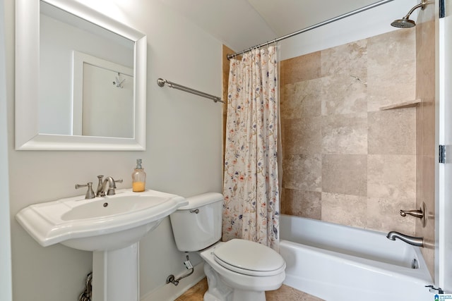 full bathroom featuring sink, toilet, and shower / bath combo