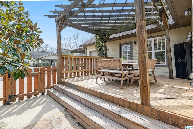 wooden terrace with a pergola