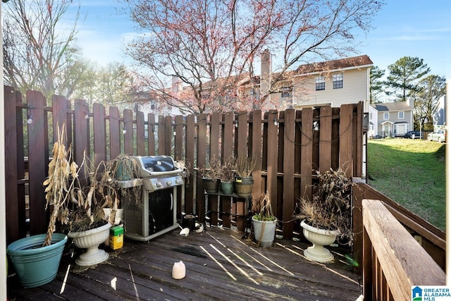 wooden deck featuring grilling area