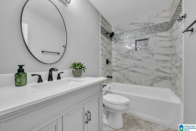 full bathroom with toilet, vanity, and tiled shower / bath combo