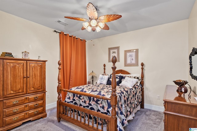 bedroom with ceiling fan and carpet