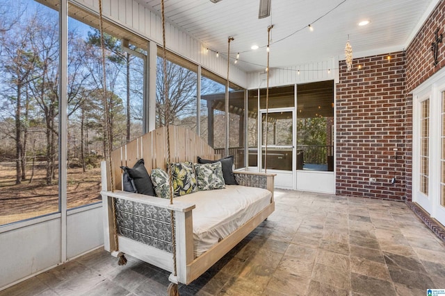 sunroom / solarium with track lighting