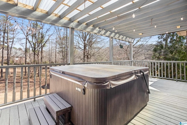 wooden terrace with a hot tub