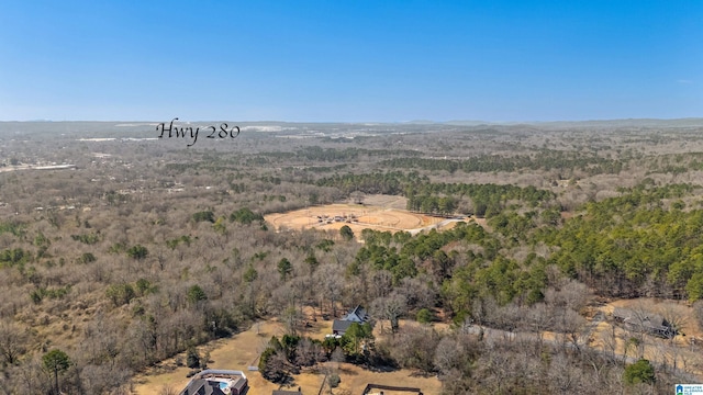 drone / aerial view with a view of trees