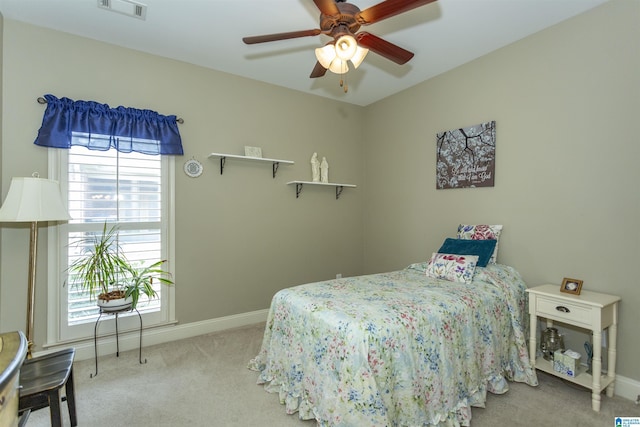 bedroom with light carpet