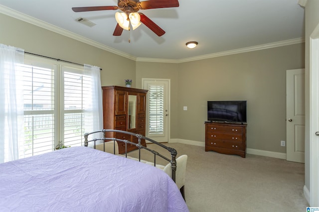 bedroom with ornamental molding, light carpet, and ceiling fan