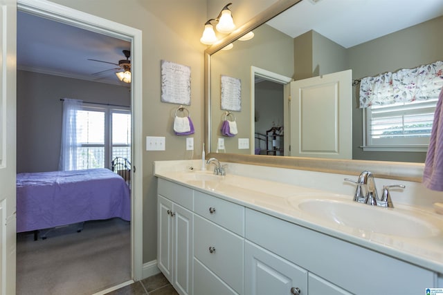 bathroom featuring ceiling fan and vanity