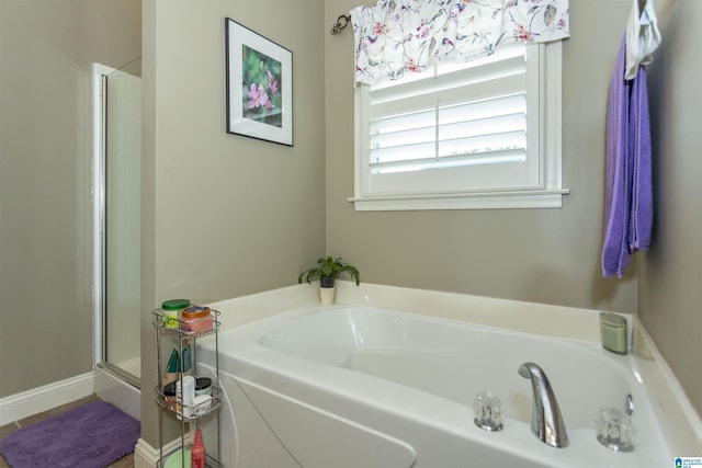 bathroom featuring plus walk in shower