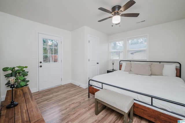 bedroom featuring ceiling fan and light wood-type flooring