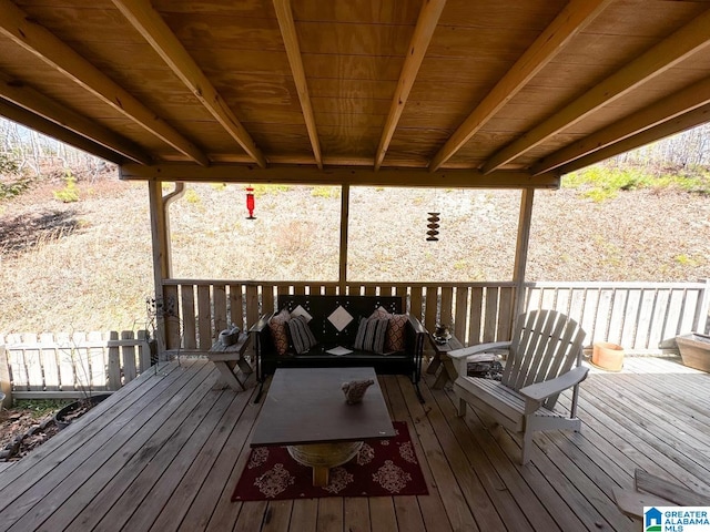 deck featuring outdoor lounge area