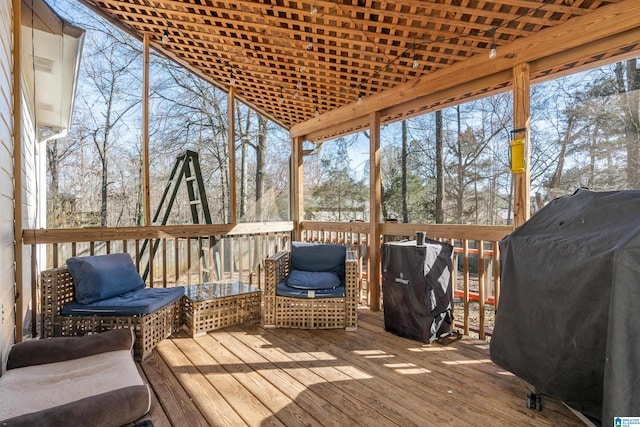 wooden terrace with area for grilling