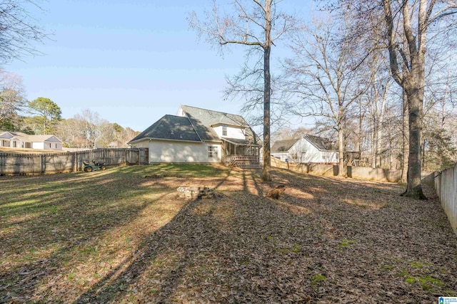 view of yard with a fenced backyard