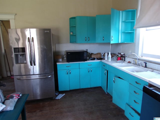 kitchen with blue cabinetry, sink, stainless steel fridge with ice dispenser, dark hardwood / wood-style floors, and dishwashing machine