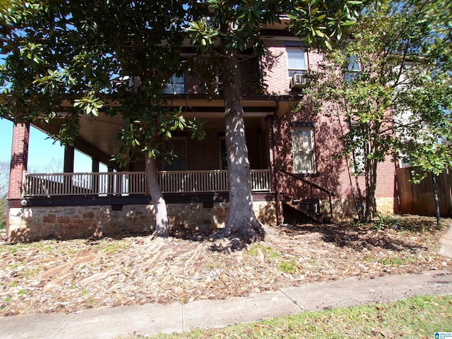 view of front of property featuring covered porch