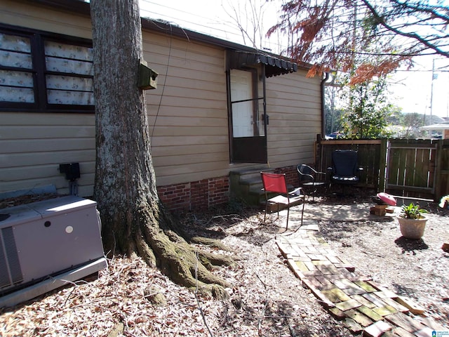 view of home's exterior with a patio