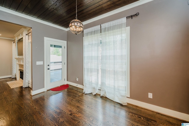 interior space with dark hardwood / wood-style flooring, wood ceiling, crown molding, and a notable chandelier