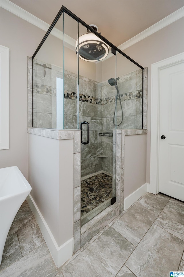 bathroom featuring sink, crown molding, and plus walk in shower