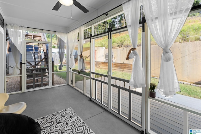 sunroom / solarium with ceiling fan