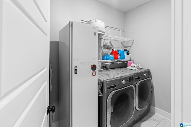 laundry room featuring washer and dryer