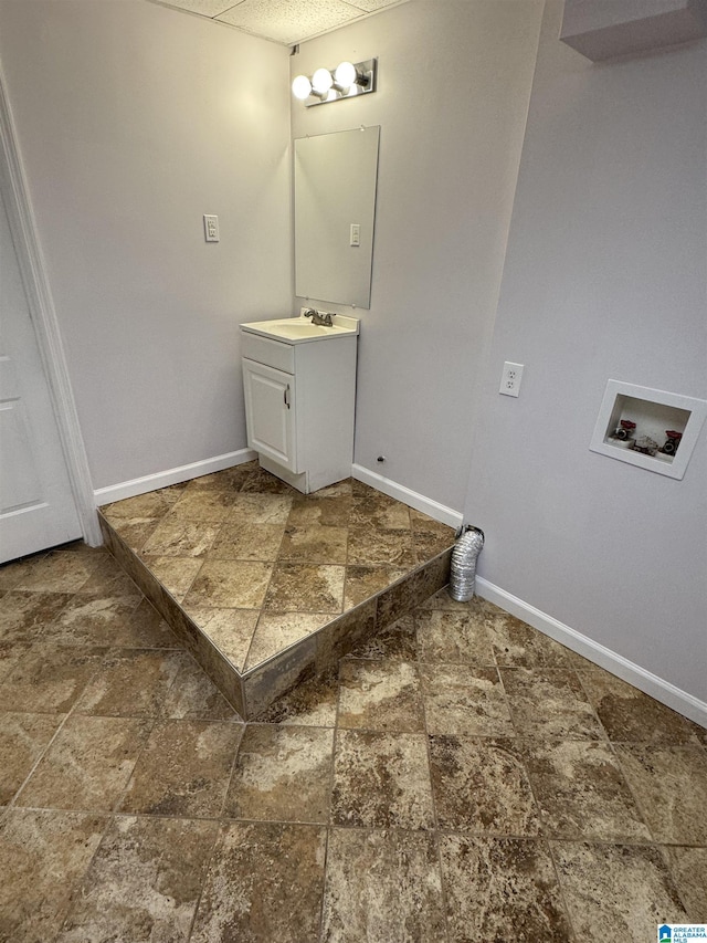 bathroom featuring vanity and a textured ceiling