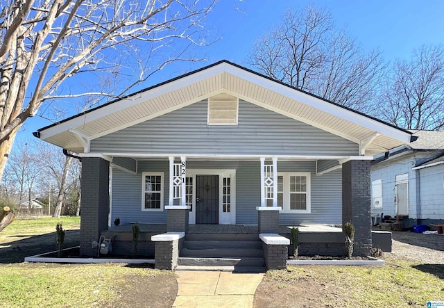 bungalow featuring covered porch