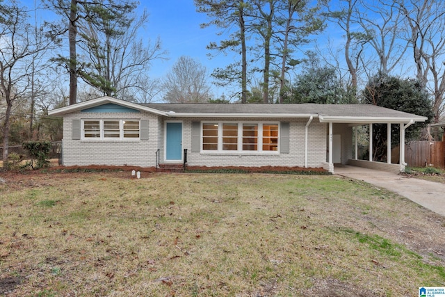 ranch-style home with a front lawn and a carport