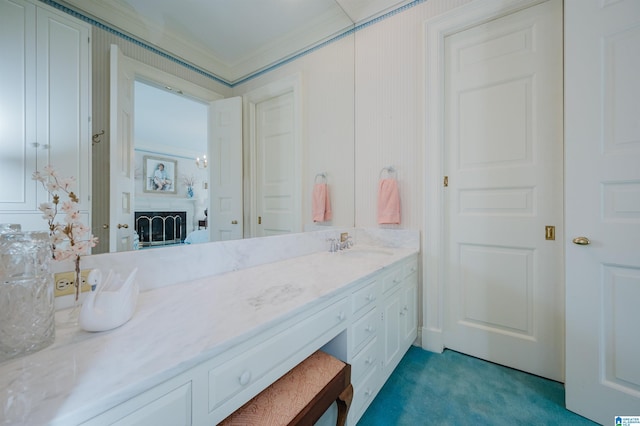 bathroom featuring vanity and crown molding