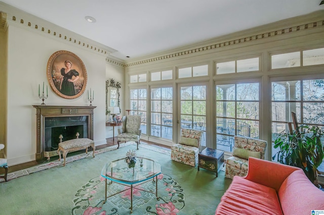 living room with dark colored carpet and a premium fireplace