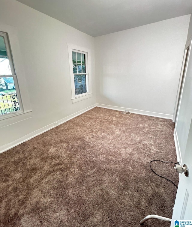 empty room with carpet floors