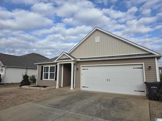 single story home with a garage and concrete driveway