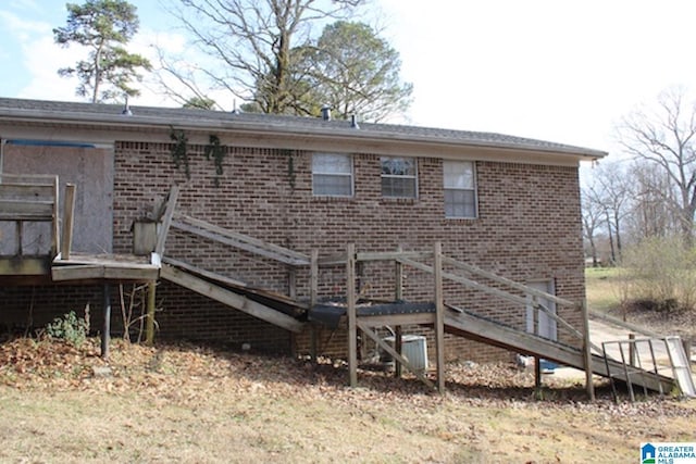 rear view of property with a deck