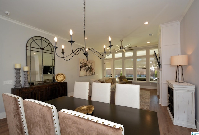 dining room with ceiling fan, recessed lighting, visible vents, dark wood finished floors, and crown molding