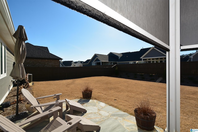 view of patio featuring a fenced backyard and cooling unit