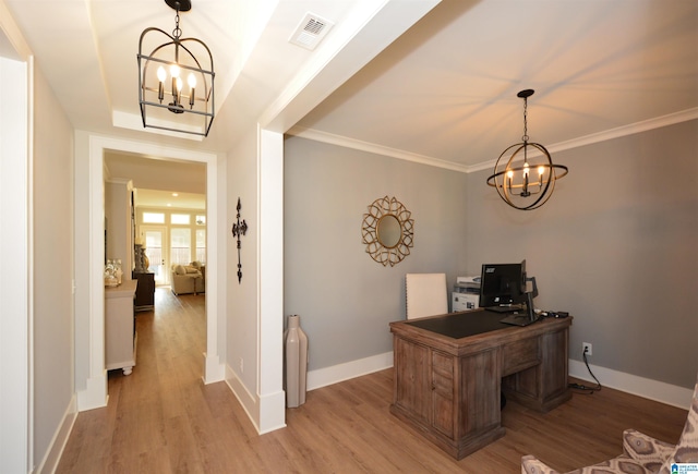 office space with baseboards, visible vents, a notable chandelier, and light wood finished floors