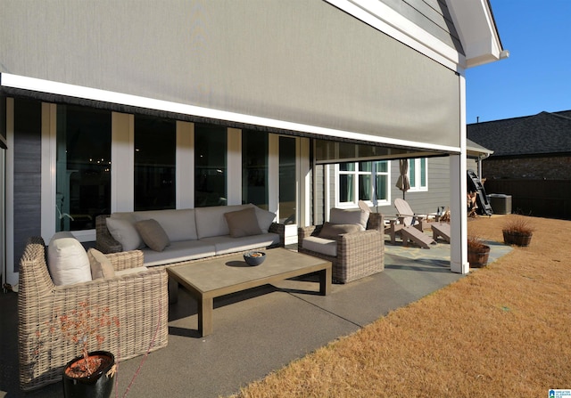 view of patio with an outdoor living space and central air condition unit