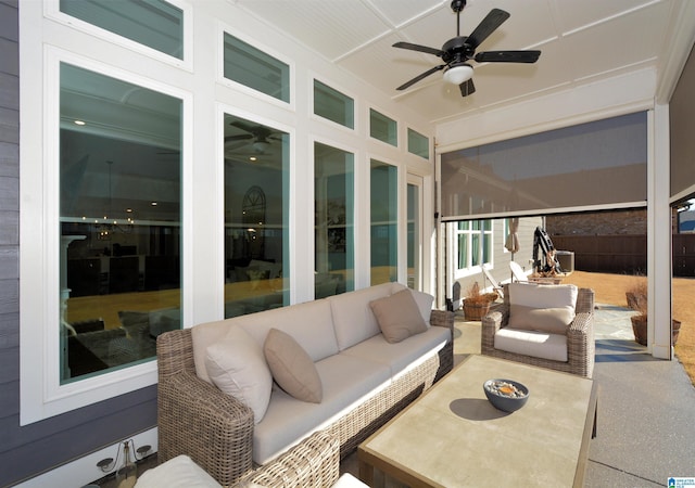 view of patio / terrace featuring fence, outdoor lounge area, and a ceiling fan