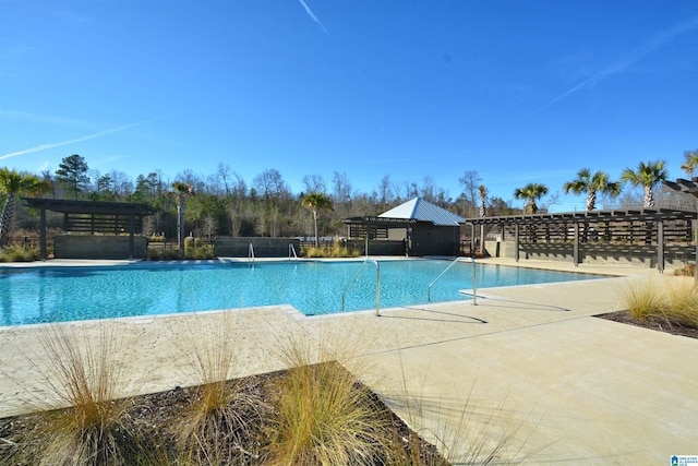 community pool featuring a gazebo and a pergola