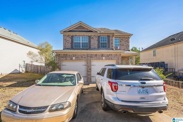 front of property featuring a garage