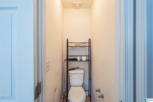 bathroom featuring toilet