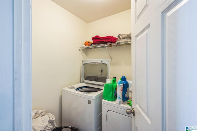 laundry room with independent washer and dryer