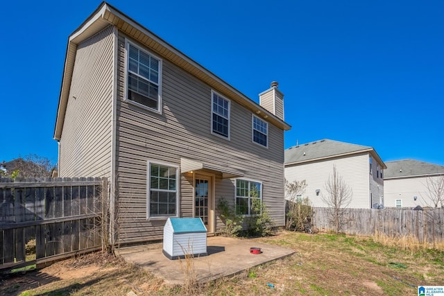 back of house featuring a patio