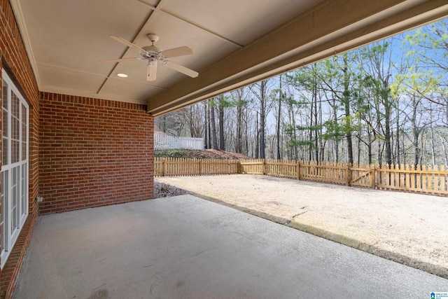 view of patio featuring ceiling fan