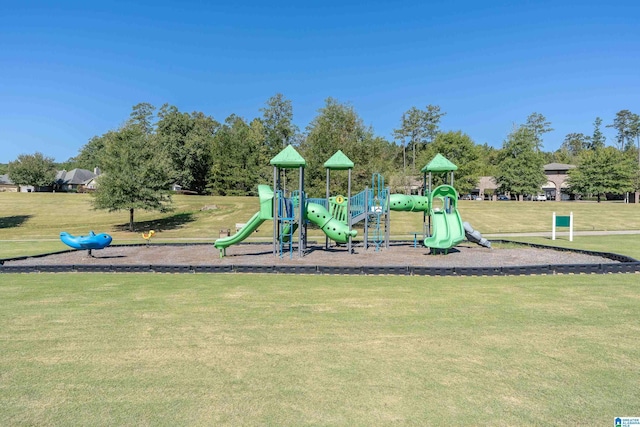 view of playground featuring a lawn