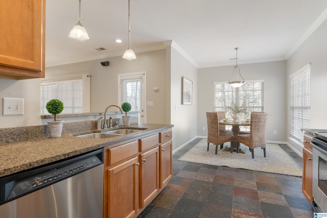 kitchen with sink, stainless steel dishwasher, hanging light fixtures, and a wealth of natural light