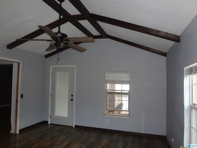 empty room with vaulted ceiling with beams, dark hardwood / wood-style flooring, and a healthy amount of sunlight