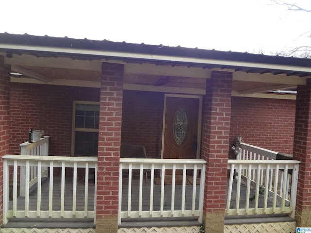 property entrance with a porch