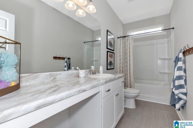 full bathroom featuring shower / bath combination with curtain, vanity, and toilet