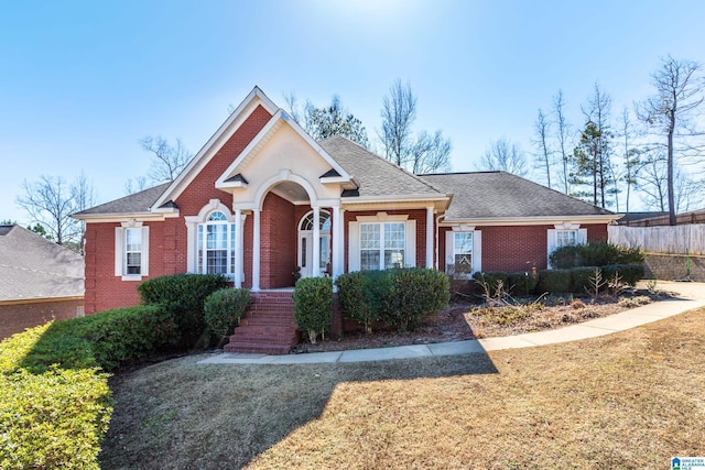 ranch-style home with a front yard