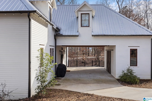 view of home's exterior featuring a carport